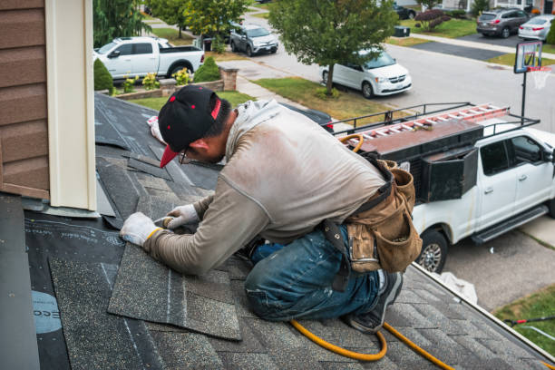 Professional Storm Damage Roof Repair technician working in McLoud, OK